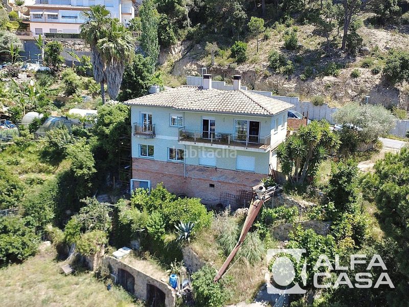 Foto 554632d9-b51c-467b-8ad2-c954a1af3daa. Casa amb calefacció aparcament a Roca Grossa Lloret de Mar