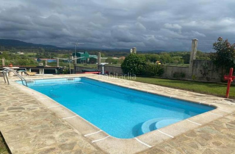 Foto 14968bed-0d71-49b4-8ea8-c617e0e9fcdf. Casa amb xemeneia calefacció aparcament piscina a Valdoviño