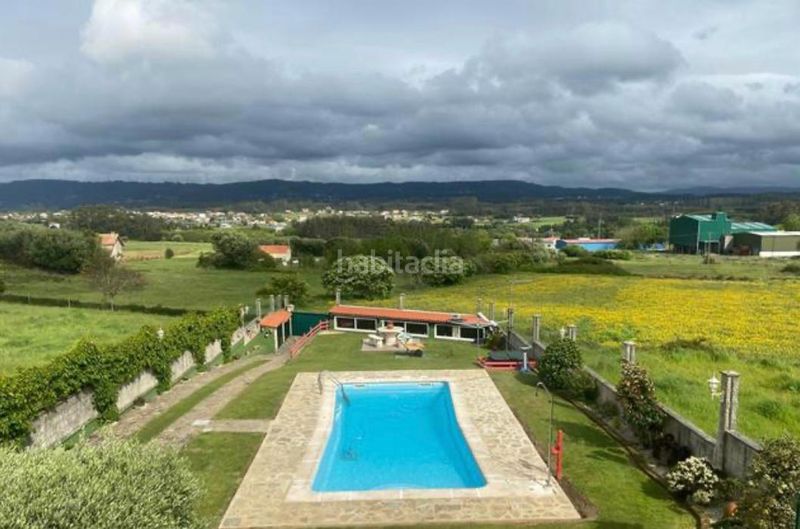 Foto 5a5fc123-1b26-4bf4-9752-7ba3e7029752. Casa amb xemeneia calefacció aparcament piscina a Valdoviño