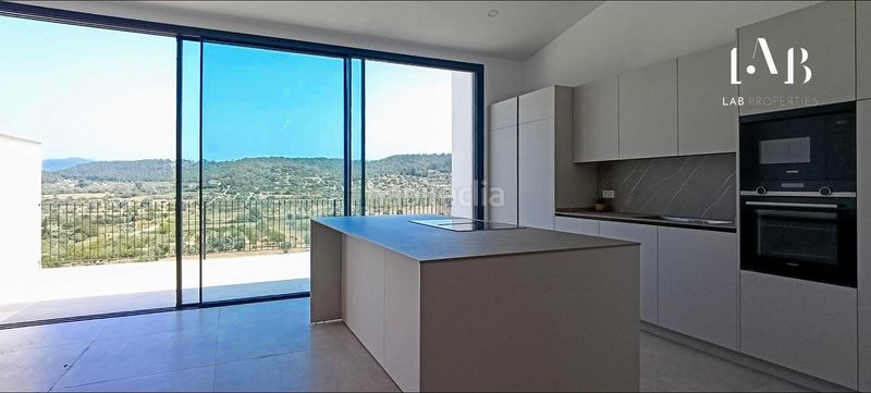 Foto 5a8f4c1f-f53f-469d-ae0b-45d56ecd4bc8. Casa adossada amb aparcament a Pòrtol Marratxí