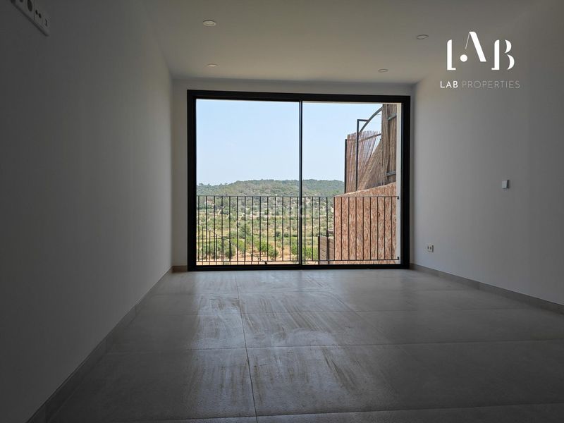 Foto eeda6b5d-6ab5-404d-a514-8cd2340fc71e. Casa adossada amb aparcament a Pòrtol Marratxí