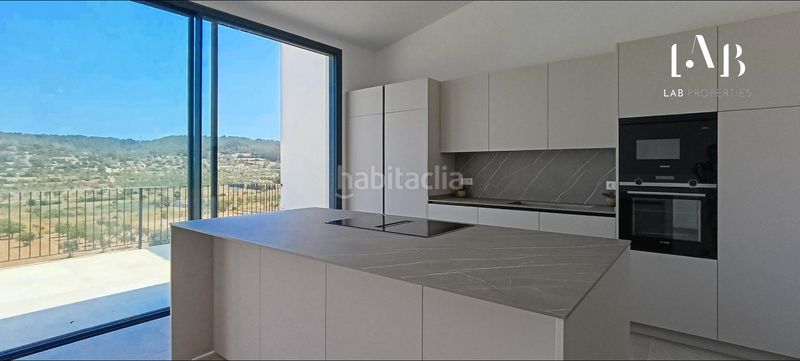 Foto f83c0ade-f915-49c8-bf56-7726bdd5714c. Casa adossada amb aparcament a Pòrtol Marratxí