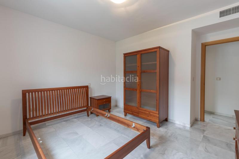 Foto fdd7f9e4-200f-4c2b-83ed-ac4106e113be. Casa pareada en calle mengibar (lan) 8 vivienda unifamiliar con patio, jardín y todas las comodidades en Granada