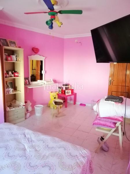 Foto e277337f-faeb-4e62-adc0-af35c975a0d1. Maison avec parking dans Centro Utrera