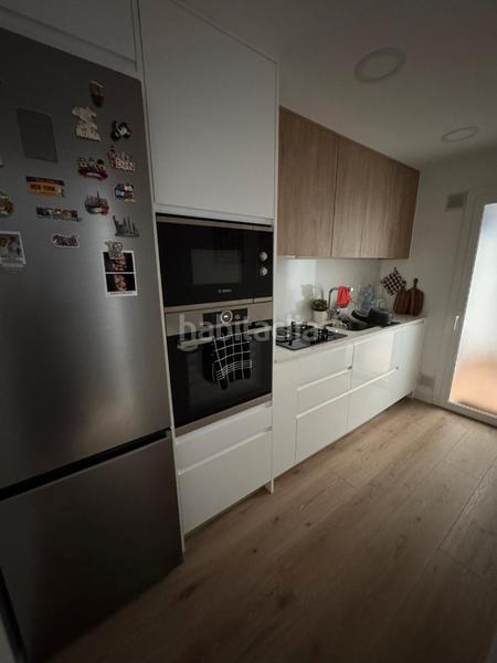 Foto b15b9d3b-0cf4-43ea-8b37-eca7020af153. Planta baixa amb calefacció a Llatí Santa Coloma de Gramenet