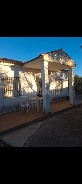 Foto 792d3f86-cc9f-4164-80c7-46290aadf4ca. Casa vendo parcela con casa en Carlota (La)