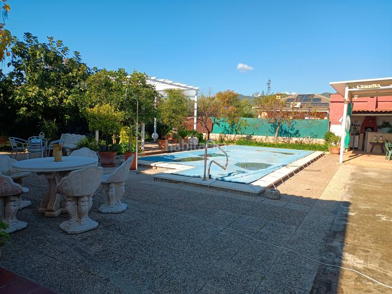 Foto cd3d0a1e-d4cd-4c0b-a6cb-27af887b0512. Chalet con parcheggio piscina in El Higuerón Córdoba
