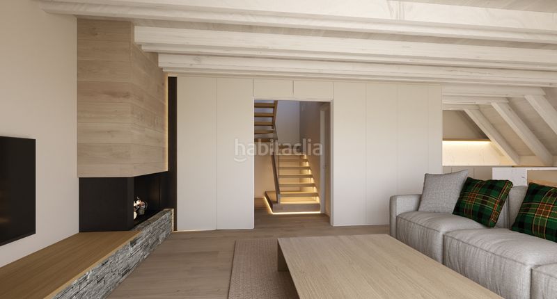 Foto 4c758a38-0ce4-45ce-9dd3-b68d260f39a2. Àtic amb xemeneia calefacció aparcament a Bossòst