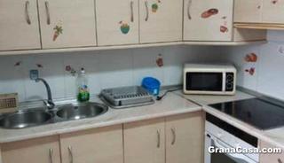 Location Appartement à Paseo de cartuja 47. Piso de 4 dormitorios y 2 baños con calefacción central en cartu