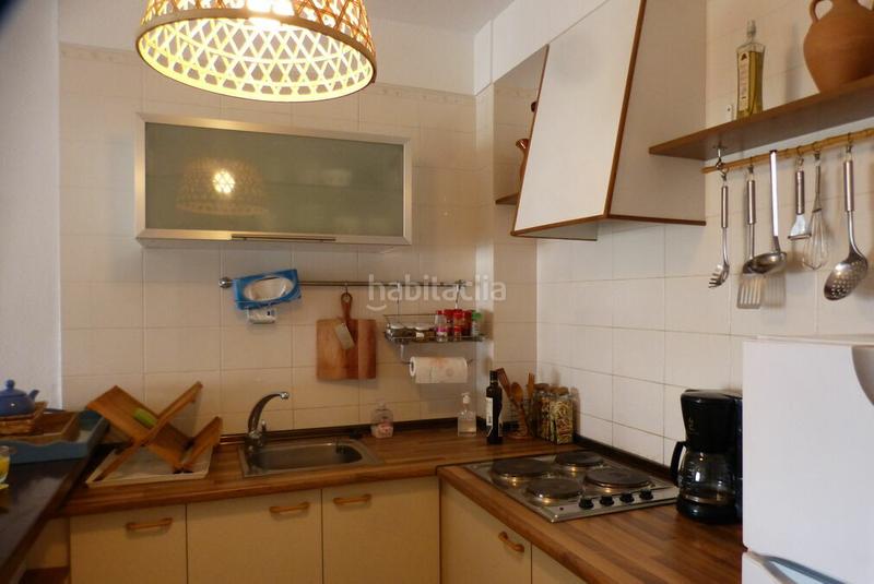 Foto ce37180b-043f-41c3-a10a-d48a0628782e. Apartamento  a la venta en la segunda planta de un edificio con vistas al canal y parking en Empuriabrava