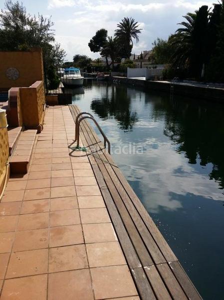 Foto 337b2128-0547-43e4-aae1-647838850b7e. Maison avec chauffage parking piscine dans Cap Ras - Creus - Falconera Empuriabrava