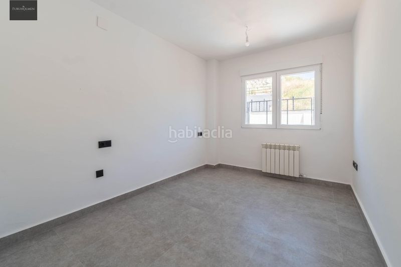 Foto ae6fc32b-062e-427a-8e7f-c290fd9ea728. Appartamento in calle camino viejo de güéjar 35 in Cenes de la Vega
