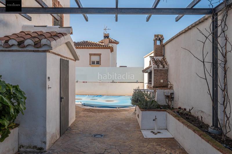 Foto b6c17662-dc83-4604-a222-875414981c26. Casa pareada  con piscina en Otura