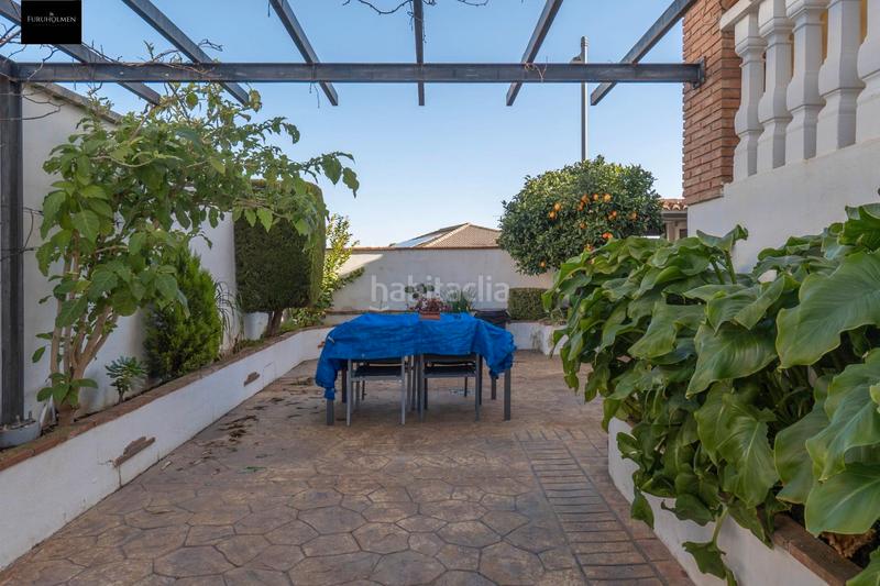 Foto dc92bd82-8131-4788-8f35-13ad3d8c0993. Casa pareada  con piscina en Otura