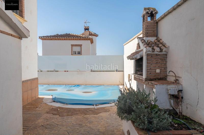 Foto fbb54534-1d12-4265-acf7-66e654299ca5. Casa pareada  con piscina en Otura