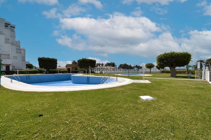 Foto 29044643-5e42-4e11-a146-1c58780f7c37. Apartamento en calle paseo marítimo 43 apartamento en mayorazgo ii, primera linea de playa en Salobreña
