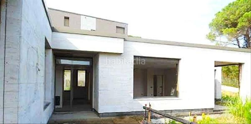 Foto 7b71290a-7476-41cd-83fb-7956c2c05f16. Chalet en avenida del golf 1 construcción en obra parada cerca del golf en Vallromanes