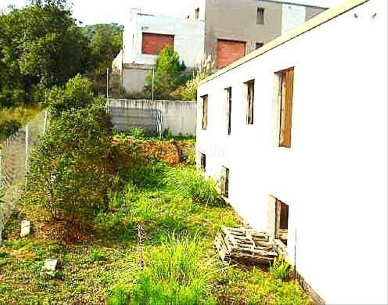 Foto 938567cc-f171-4117-b310-7ccb8ab1f0f7. Chalet en avenida del golf 1 construcción en obra parada cerca del golf en Vallromanes