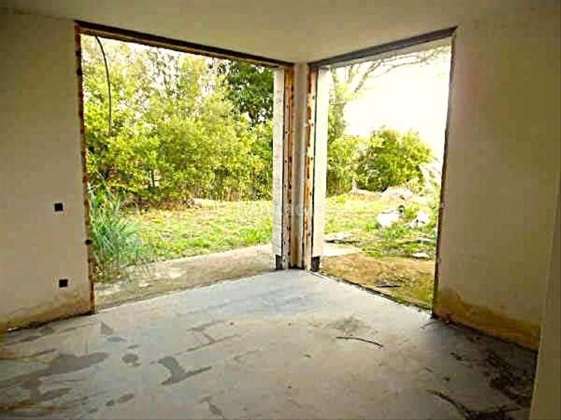 Foto 9e977b52-c156-48e8-b3f7-b3cc234671f6. Chalet en avenida del golf 1 construcción en obra parada cerca del golf en Vallromanes