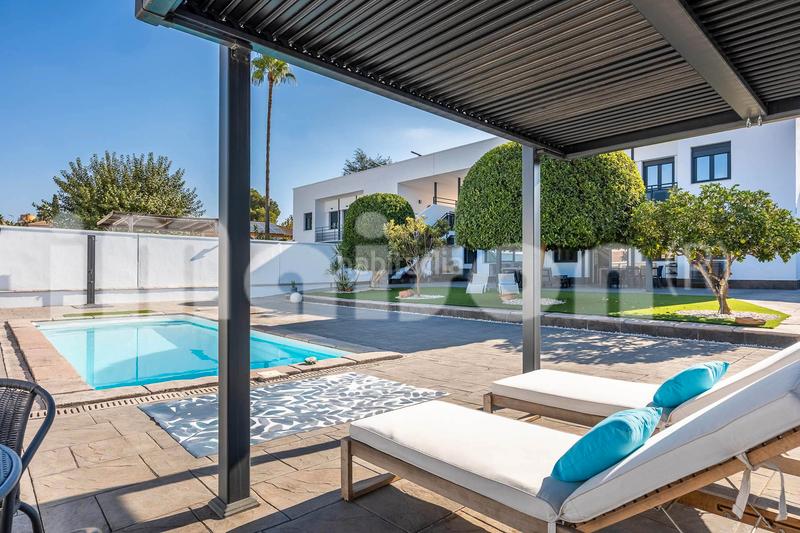Foto 83619bbe-7d76-4025-9b5e-e2b5fdc3d8db. Xalet amb xemeneia calefacció aparcament piscina a Alcalá de Guadaira
