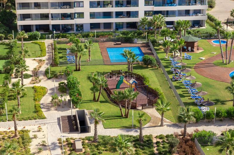 Foto 400ad951-f74f-4936-8720-5fa77eb4020e. Piccolo appartamento con parcheggio piscina in Punta Prima Orihuela