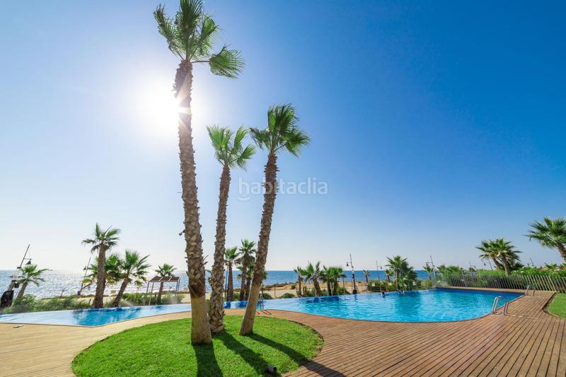 Foto 5e3f42a3-5718-47fa-be22-021ceb47968d. Piccolo appartamento con parcheggio piscina in Punta Prima Orihuela