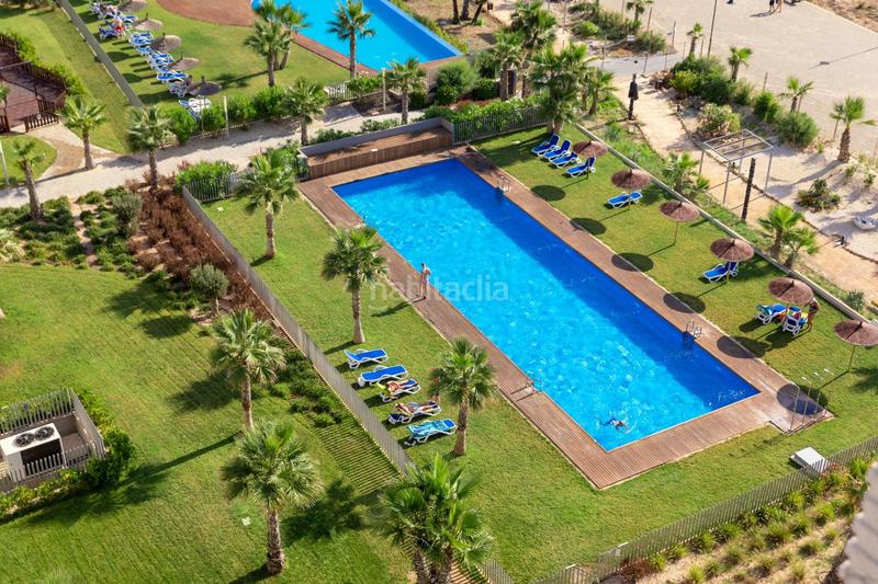 Foto ccbfe9a1-00d2-4a55-be25-5de025b4c192. Piccolo appartamento con parcheggio piscina in Punta Prima Orihuela