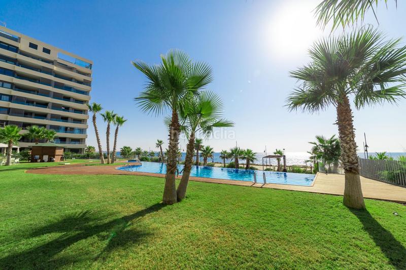 Foto e85f7a8e-701a-466d-8e12-e21568767623. Piccolo appartamento con parcheggio piscina in Punta Prima Orihuela