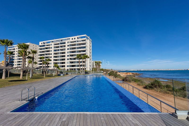 Foto 719c1a84-cb22-4efe-b3b1-243d793503c2. Pis amb calefacció aparcament piscina a Punta Prima Torrevieja