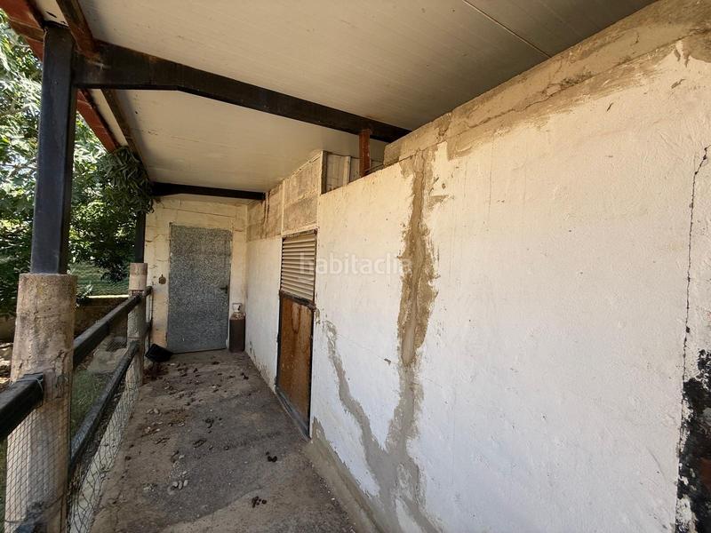 Foto be14cf31-ebf9-460c-af52-d09e7a90db30. Chalet avec parking piscine dans Santa Bárbara Llíria