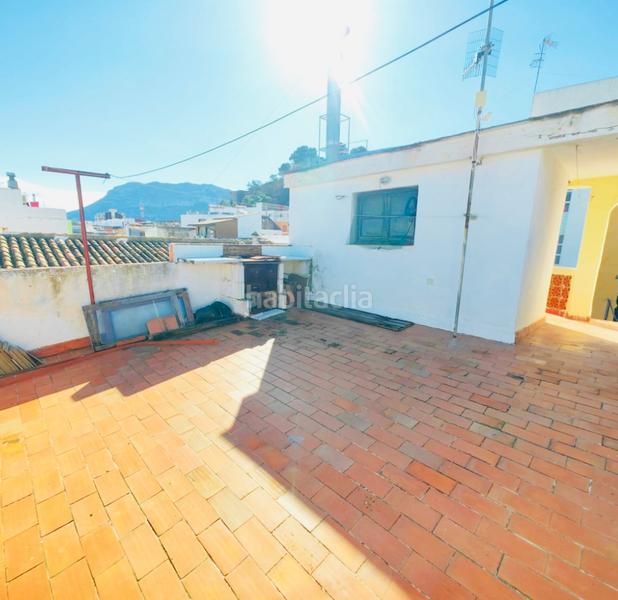 Foto 17910e82-0185-4fc0-b2c3-a521652b818e. Casa adossada amb xemeneia calefacció a El Puerto Dénia