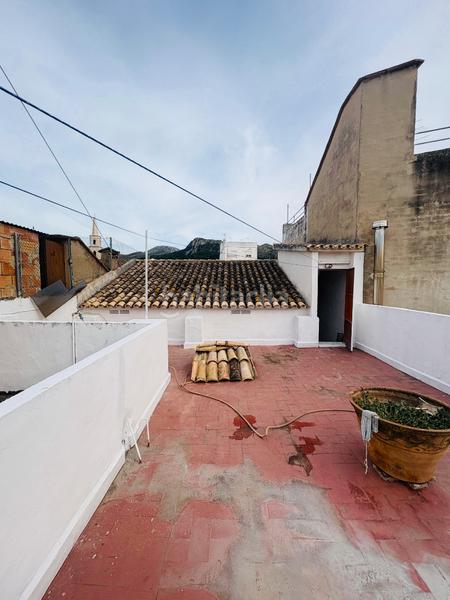 Foto 2c7da30e-2a15-4719-9176-443dad24640c. Towny house with fireplace heating parking in Pego