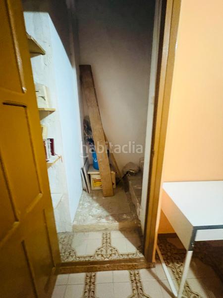 Foto d68685c2-8c59-4a88-b856-1394cb86320f. Towny house with fireplace heating parking in Pego