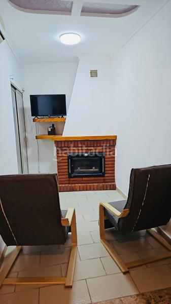 Foto ea92ce3c-1b84-4409-8daf-4791b3c1efb4. Towny house with fireplace heating parking in Pego