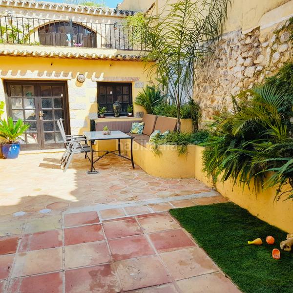 Foto 3f44a41a-c5f4-4809-9f45-57c83ddf2ba3. Casa adossada amb xemeneia calefacció a Xaló