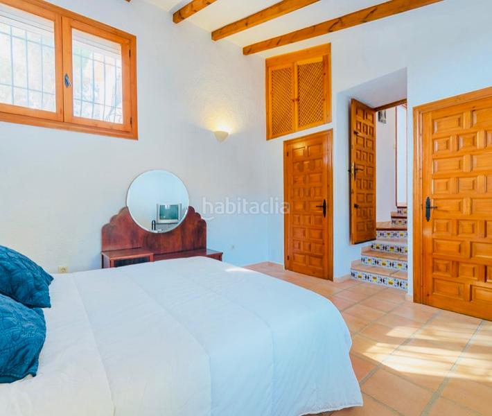 Foto 10bbe530-9a4b-4bde-8fb4-dde6e9daecf7. Chalet avec cheminée chauffage parking piscine dans Xàbia