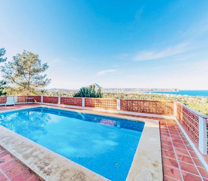 Foto 38f3634b-bb68-429f-8594-6d996ef6eed4. Chalet avec cheminée chauffage parking piscine dans Xàbia