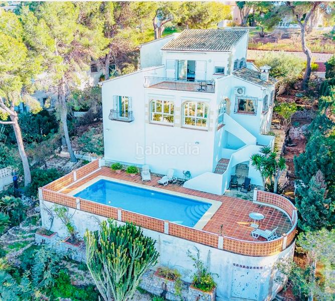 Foto d5ecf8e5-f7fc-4553-8c41-92b5fa7e1ba8. Chalet avec cheminée chauffage parking piscine dans Xàbia