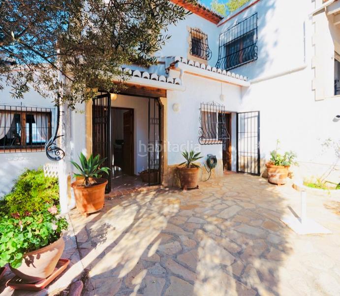 Foto d70c15e5-65d9-47ea-ac7d-3abb65331021. Chalet avec cheminée chauffage parking piscine dans Xàbia