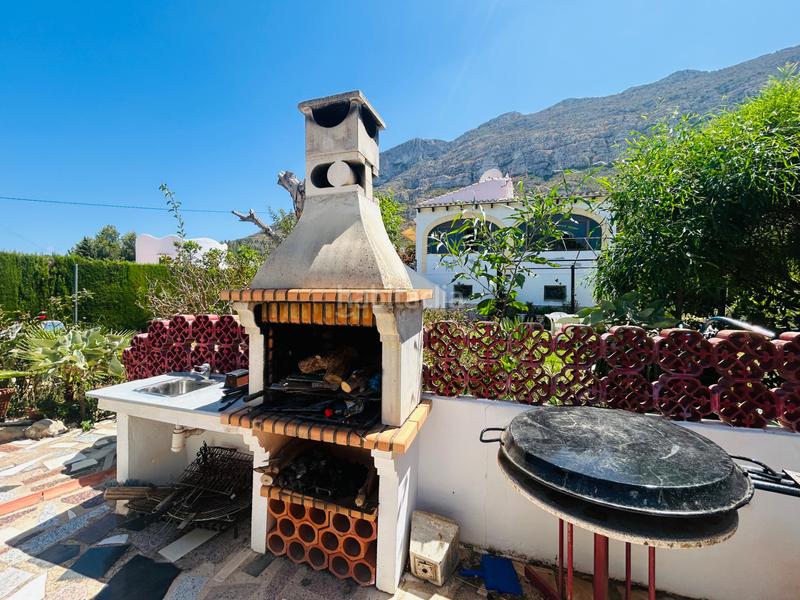 Foto dca9b6a9-ff22-4254-bf0f-72a10c2a5171. Chalet avec cheminée chauffage parking dans El Montgó Dénia