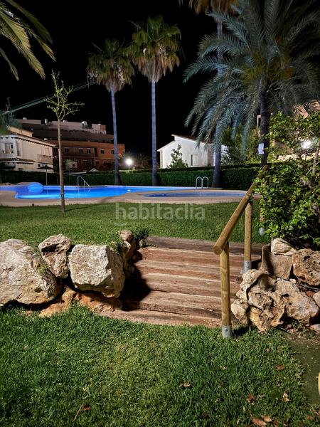 Foto f4769cb7-7b25-4ad2-9c2f-bbda4edc7ba7. Casa adossada amb calefacció aparcament piscina a Dénia