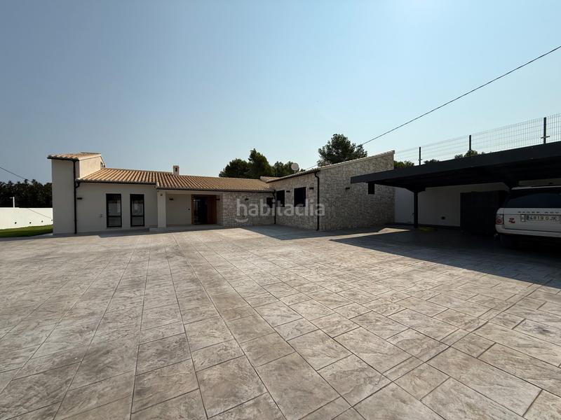 Foto f04a3d88-ac20-41ff-898e-4b5416c46e4d. Chalet mit kamin heizung parking pool in Devessa - Monte Pego Dénia