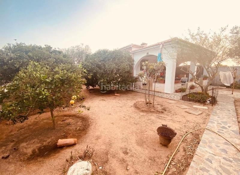 Foto ee15cbcc-3427-40b8-bcf3-56d2a7b00d36. Chalet en venta chalet en oliva, a pocos minutos andando de la playa, playa de les deveses! en Dénia