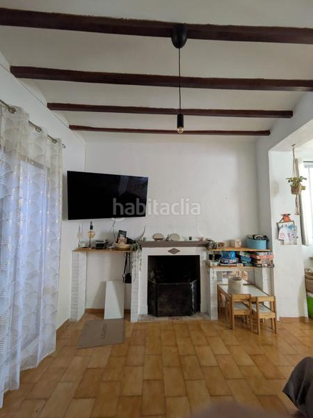 Foto 7b7c5d19-5e00-4275-8b30-518bb68f3422. Casa adossada amb xemeneia a Alcalalí
