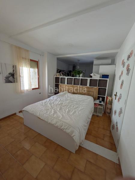 Foto ca6cbeab-d066-4c05-9f42-31e5b73a0bb6. Casa adossada amb xemeneia a Alcalalí