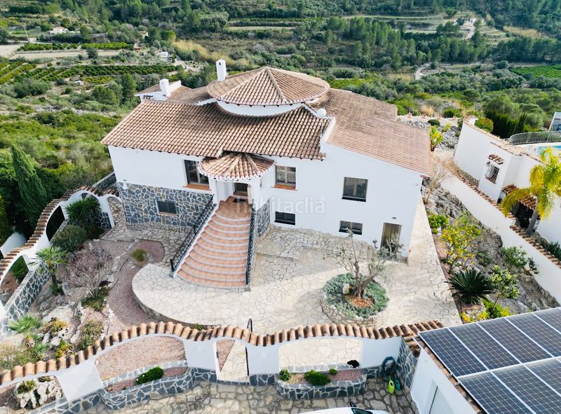 Foto 44a9e4e8-e5bb-4746-a7ca-d2b5cc57e3df. Xalet amb xemeneia calefacció aparcament piscina a Dénia