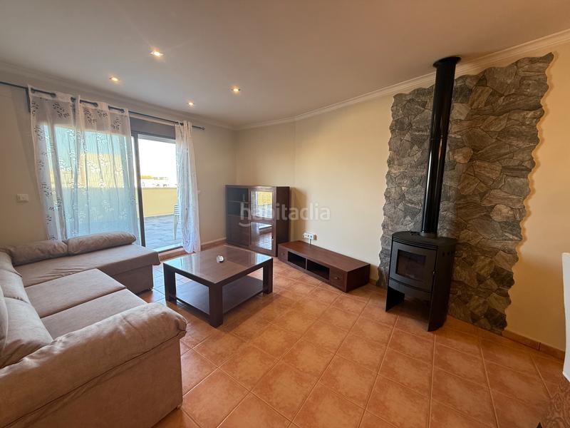 Foto b051632f-f655-4749-8591-cd6331fdf60f. Rent flat with fireplace heating parking in Ondara