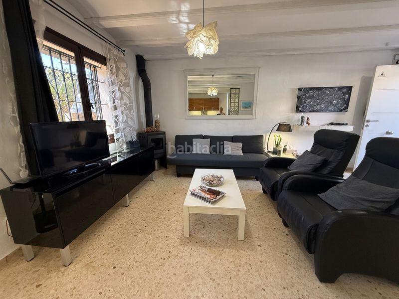 Foto 0ca7d7ea-5339-4bdf-9313-31bfa7a58859. Casa adossada amb xemeneia calefacció piscina a El Puerto Dénia