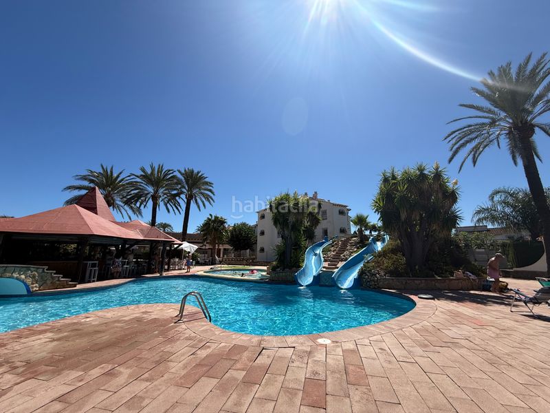 Foto e4d6c047-07af-408b-99d9-128d592f5e81. Casa adossada amb xemeneia calefacció piscina a El Puerto Dénia