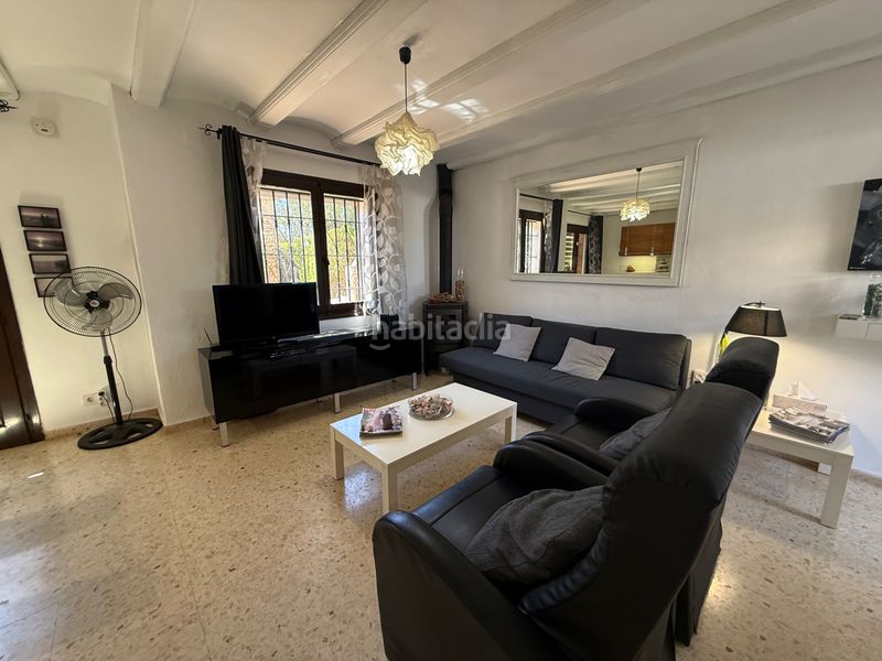 Foto ff68a618-0d59-434f-8a1a-d8051c385d5e. Casa adossada amb xemeneia calefacció piscina a El Puerto Dénia
